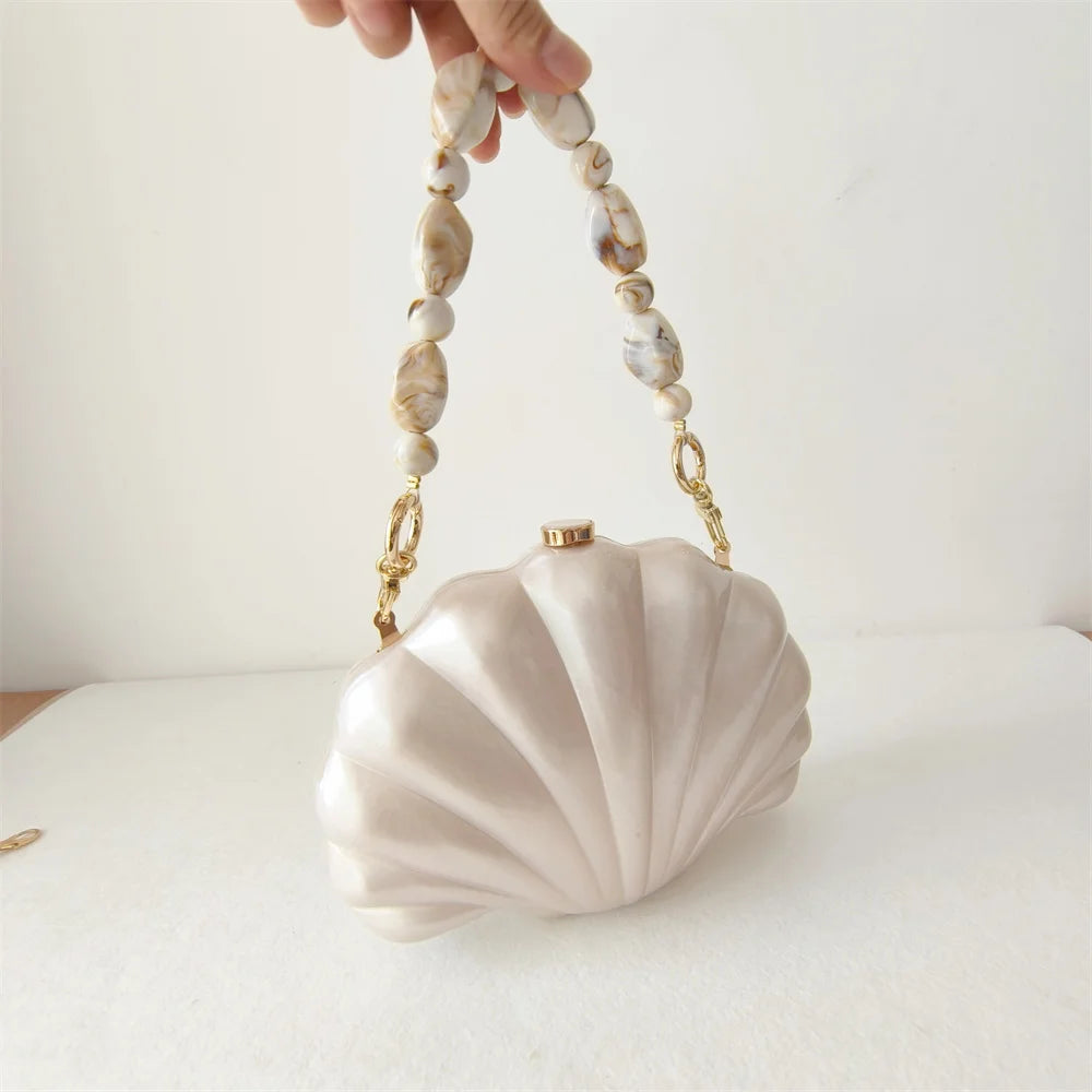 Clutch Concha Perolada com Alça Marmorizada