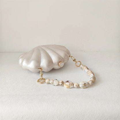 Clutch Concha Perolada com Alça Marmorizada