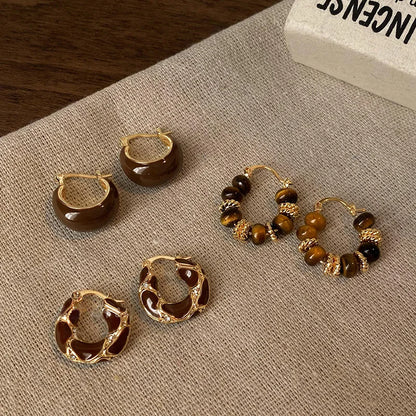 Conjunto Trio de Argolas Douradas com Detalhes Marrom